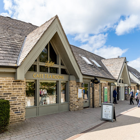 RHS HARLOW CARR GARDENS, HARROGATE, UK - APRIL 25, 2023.  The exterior of the Betty's Cafe and Tea Rooms at RHS Harlow Carr in Harrogate with copy spaceのeditorial素材