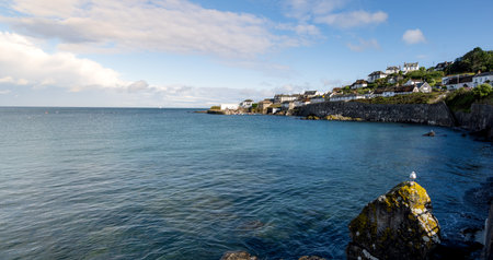Panoramic andscape view of the picturesque Cornish fishing village and harbour of Coverackの写真素材