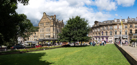 PROSPECT SQUARE, HARROGATE, UK - AUGUST 6, 2023.  A panoramic exterior of the Victorian architecture of Prospect Square with the war memorial and Betty's Cafe and Tea Rooms in Harrogate, North Yorkshireのeditorial素材