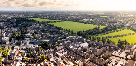 An aerial cityscape of Harrogate town with The Stray public park and Victorian architecture at sunsetのeditorial素材