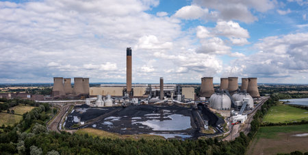 DRAX POWER STATION, SELBY, NORTH YORKSHIRE, UK - AUGUST 3, 2023. Aerial landscape view of Drax coal fired Power Station with Biomass storage tanks and coal stackのeditorial素材