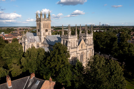 SELBY, NORTH YORKSHIRE, UK - AUGUST 8, 2023.  Aerial townscape skyline view of the ancient architecture of Selby Abbey in the popular North Yorkshire market townのeditorial素材