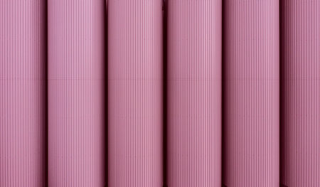 Full frame row of large scale, industrial storage tanks or silos in a Barbie pink colour at a chemical plant with copy space aboveの写真素材