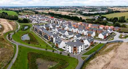LEEDS, UK - AUGUST 25, 2023.  A modern housing estate on the outskirts of Leeds with contemporary style houses and parklandのeditorial素材