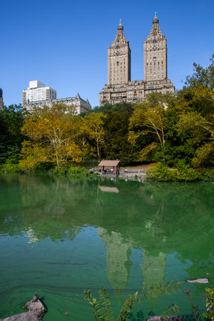 CENTRAL PARK, NEW YORK, USA, - SEPTEMBER 15, 2023.  The San Remo apartment and residential building next to The Lake in Central Park New York cityのeditorial素材