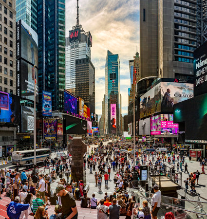 TIMES SQUARE, NEW YORK, USA, - SEPTEMBER 15, 2023. Panoramic view of the buildings and electronic billboards in Times Square New York city with crowds of peopleのeditorial素材