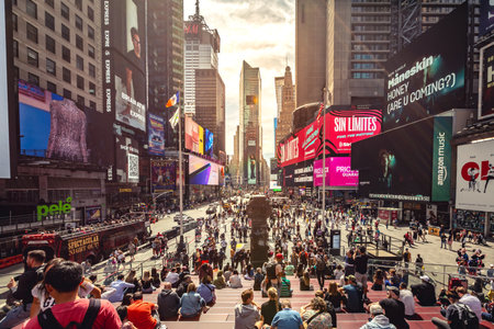 TIMES SQUARE, NEW YORK, USA, - SEPTEMBER 15, 2023. Panoramic view of the buildings and electronic billboards in Times Square New York city with crowds of people at sunsetのeditorial素材