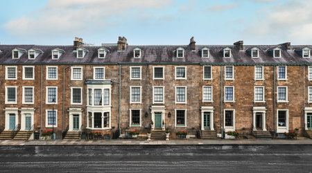 Panoramic view of exclusive four storey Victorian townhouses in an exclusive area of a UK city called Millionaire's Row with copy spaceの写真素材