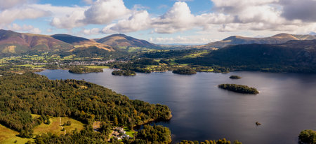 Aerial panoramic landscape of the Lake District town of Keswick in the Northern Lake District with Derwent Water on a beautiful Summer dayの写真素材