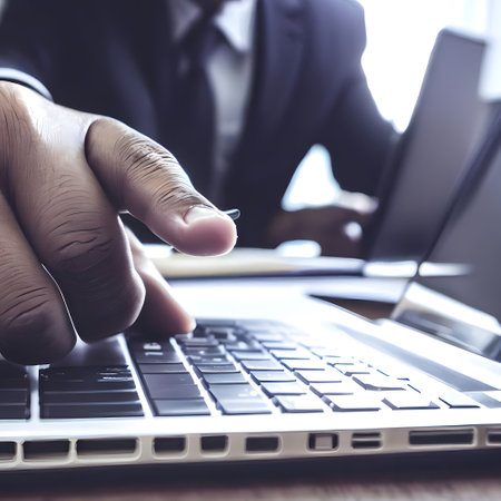 professional businessman using laptop to connect with worldwide networkの素材