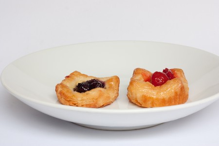 bread on disk on white backgroundの写真素材