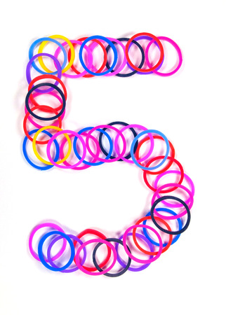 Colorful rubber band No.5 with white isolate, studio shot.