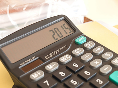 2015 Calaulate by calculator in retail business.の写真素材