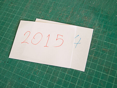 2014-2015 hand wirte paper note on green cutting-board.の写真素材