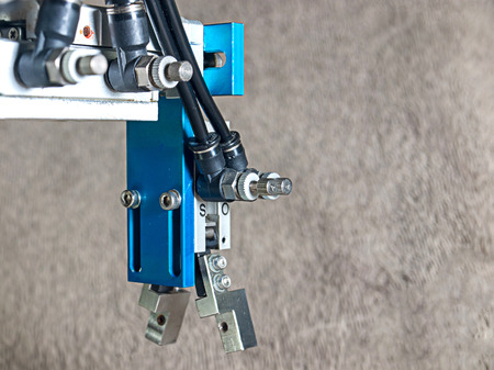 Back view Aluminum pneumatic  robot hand grip.の写真素材