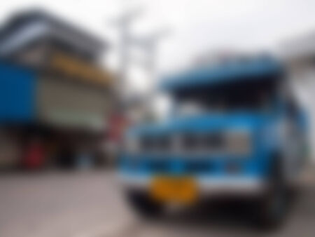 Natural bright blurred background of blue truck.の写真素材