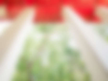 Natural bright blurred background of red ceiling.の写真素材