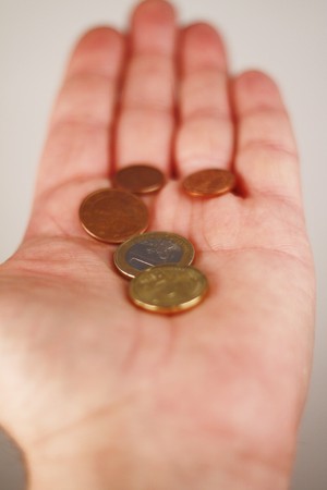 Euro in an human hand