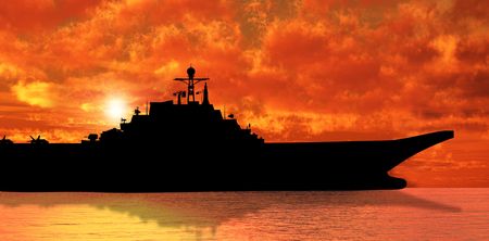 Aircraft carrier on sea near Iraq over sunsetの写真素材