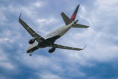 Montreal, Quebec - 06-30-2018 : Air Canada Express C-FRQP landing to YUL from LGAのeditorial素材