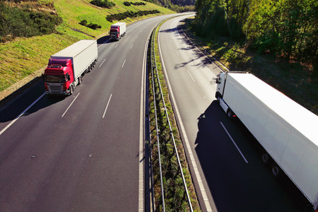 Trucks on the highway. Freight transportation in Europe.の写真素材