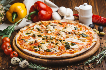 Italian pizza with pesto sauceの写真素材