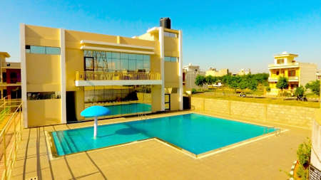 Pune, Maharashtra, India,- March 2020 : Different views of a small swimming pool in Puneのeditorial素材