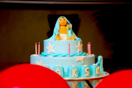 little art of boy sitting on a cakeの写真素材