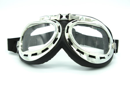 Vintage motorcycle safety glasses on white backgroundの写真素材