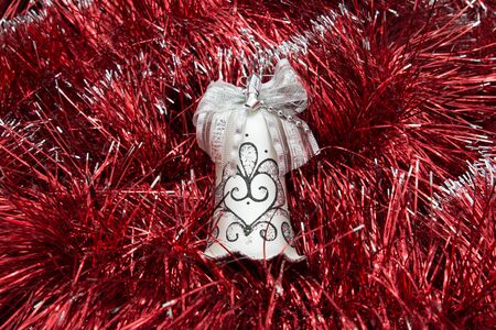 Christmas and New Year background with tinsel and Christmas toysの写真素材