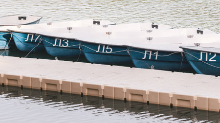 The row of the boats with numbers near the piersの写真素材