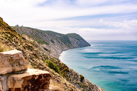 Cliff in the Black sea daylight cloudy skyの写真素材