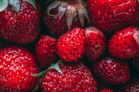 Strawberry and wild strawberry macro closeup textureの写真素材