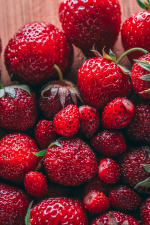 Strawberry and wild strawberry macro closeup textureの写真素材