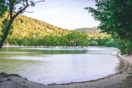 Beautiful mountain lake at the sunsetの写真素材