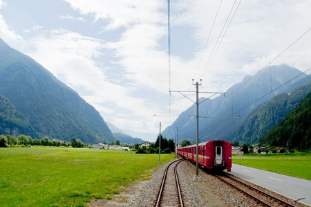 12 july 2009-tirano-italy-Swiss mountain train Bernina Express crossed through the high montains,suisseのeditorial素材