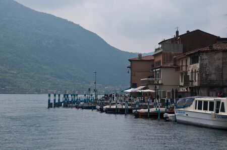 15 april 2017-peschiera maraglio-italy-overlooking the port of Peschiera Maraglio of montisolaのeditorial素材