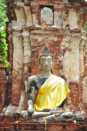 Ancient damage buddha statue in Ayutthaya, Thailand.の写真素材