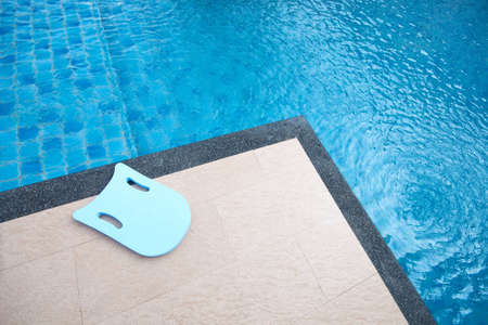  boogie board in swimming pool 
