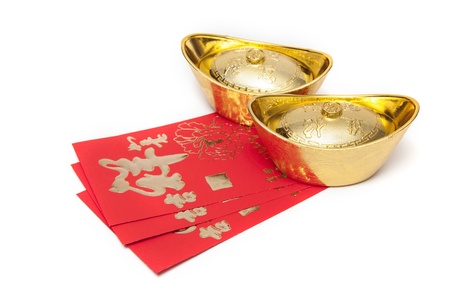 Red envelopes and Gold for Chinese New Year on white backgroundの写真素材