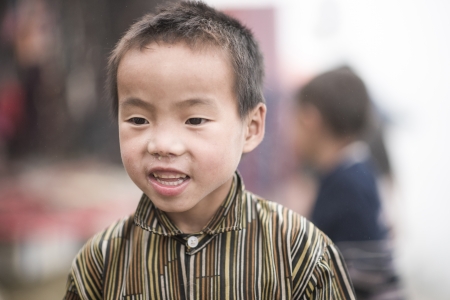 Unidentified H mong s child in Sa Pa, Vietnam December 04, 2012  Sapa is a mountain town in Vietnam and H mong are the 8th largest ethnic group in Vietnam のeditorial素材