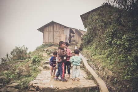 Unidentified H mong s child in Sa Pa, Vietnam December 04, 2012  Sapa is a mountain town in Vietnam and H mong are the 8th largest ethnic group in Vietnam のeditorial素材