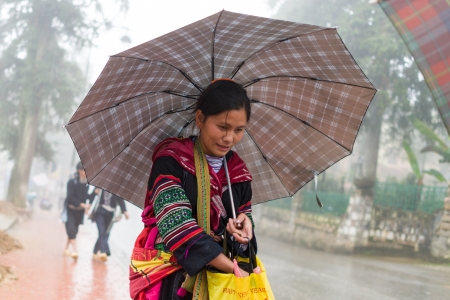 Unidentified H mong woman in Sa Pa, Vietnam December 04, 2012  Sapa is a mountain town in Vietnam and H mong are the 8th largest ethnic group in Vietnam のeditorial素材