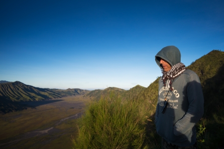 JAVA,INDONESIA-MAY 05 : Tourists at viewpoint on Mount Penanjakan,The best views from Mount Bromo to the Sand Sea below and the surrounding volcanoes are at sunrise on May 05,2013 in Java , Indonesia.のeditorial素材