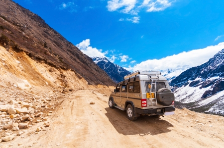 SIKKIM, INDIA - APRIL 17  Tourist jeep at Chopta Valley  It is located at 4000 metres above sea level, and offers a splendid view of Himalayan peaks and Chaukhamba stretched widely Lachen on April17, 2012 in Sikkim, India  のeditorial素材