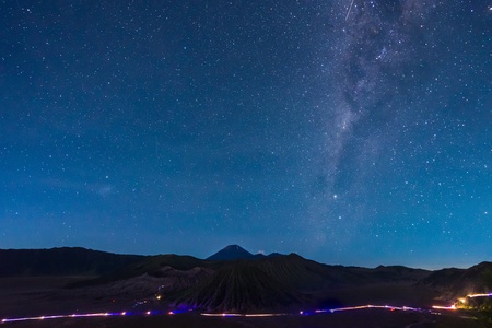 Extreme long exposure image showing star above the Bromo Volcano, Indonesiaの写真素材
