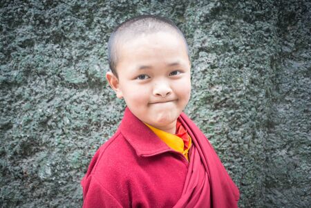 GANGTOK, SIKKIM, INDIA - AUG 19  An Unidentified Tibetan lama prays mantra at Ramtek Monastery on August 19, 2012 in Gungtok, Sikkim, Indiaのeditorial素材