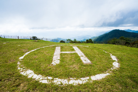 Helicopter landing pad on grassの写真素材