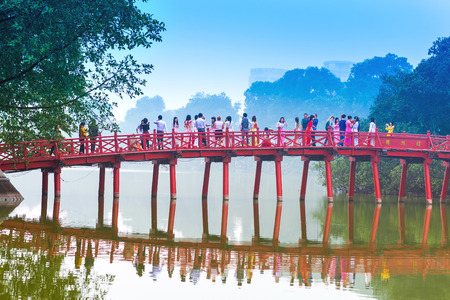 HANOI, VIETNAM - DECEMBER 01  Huc Bridge over the Hoan Kiem Lake on December 01, 2012 in Hanoi, Vietnam  The wooden red-painted bridge connects the shore and the Jade Island on which Ngoc Son Temple standsのeditorial素材