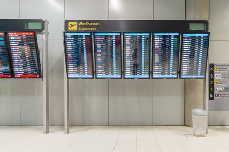 BANGKOK - MAR 01 : Departure information monitor at Suvanaphumi Airport on March 01, 2015. Suvarnabhumi airport is world\'s 4th largest single-building airport terminal.のeditorial素材